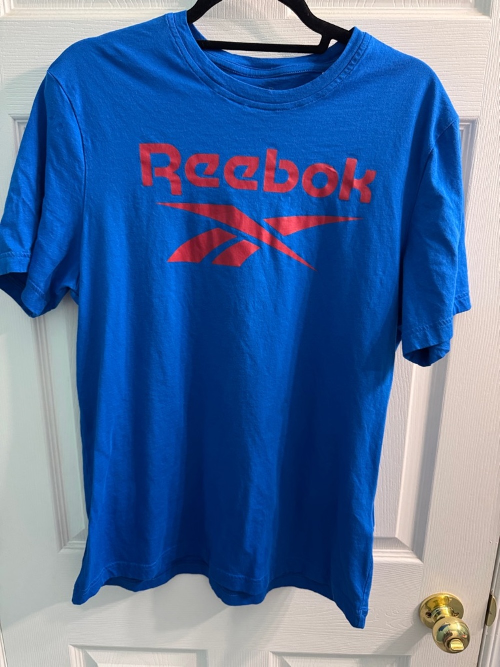 Reebok Men’s Royal Blue Short Sleeve Tee with Red Logo